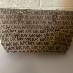 Like new brown and tan Michael Kors purse